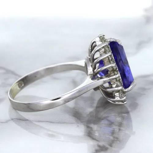 5.06ct Trillion Tanzanite Ring with Diamond Halo in 14K White Gold