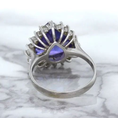 5.06ct Trillion Tanzanite Ring with Diamond Halo in 14K White Gold