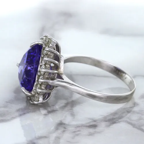 5.06ct Trillion Tanzanite Ring with Diamond Halo in 14K White Gold