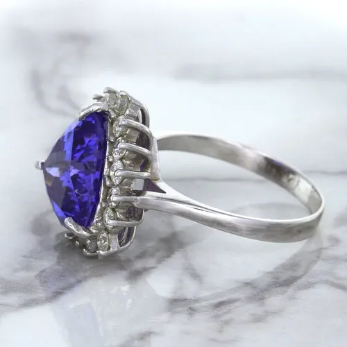 5.06ct Trillion Tanzanite Ring with Diamond Halo in 14K White Gold