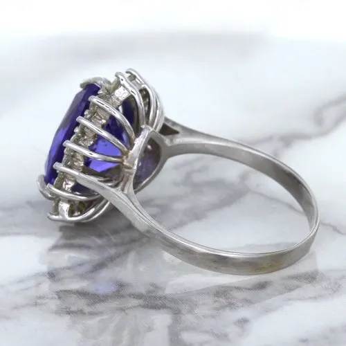 5.06ct Trillion Tanzanite Ring with Diamond Halo in 14K White Gold