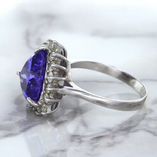 5.06ct Trillion Tanzanite Ring with Diamond Halo in 14K White Gold