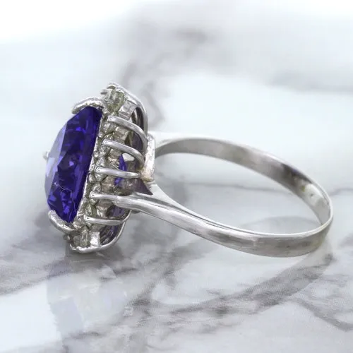 5.06ct Trillion Tanzanite Ring with Diamond Halo in 14K White Gold