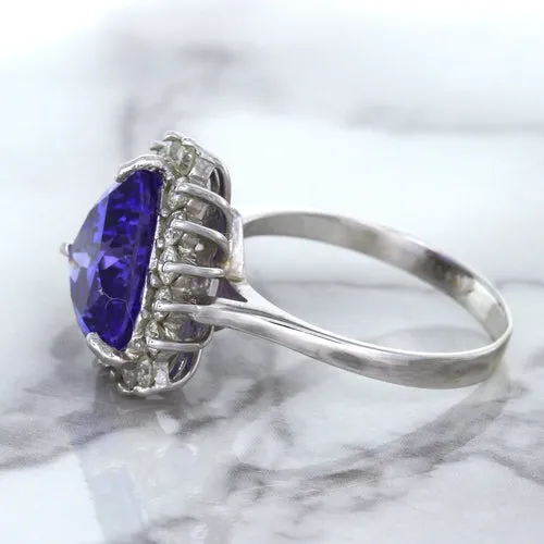 5.06ct Trillion Tanzanite Ring with Diamond Halo in 14K White Gold