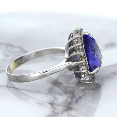 5.06ct Trillion Tanzanite Ring with Diamond Halo in 14K White Gold